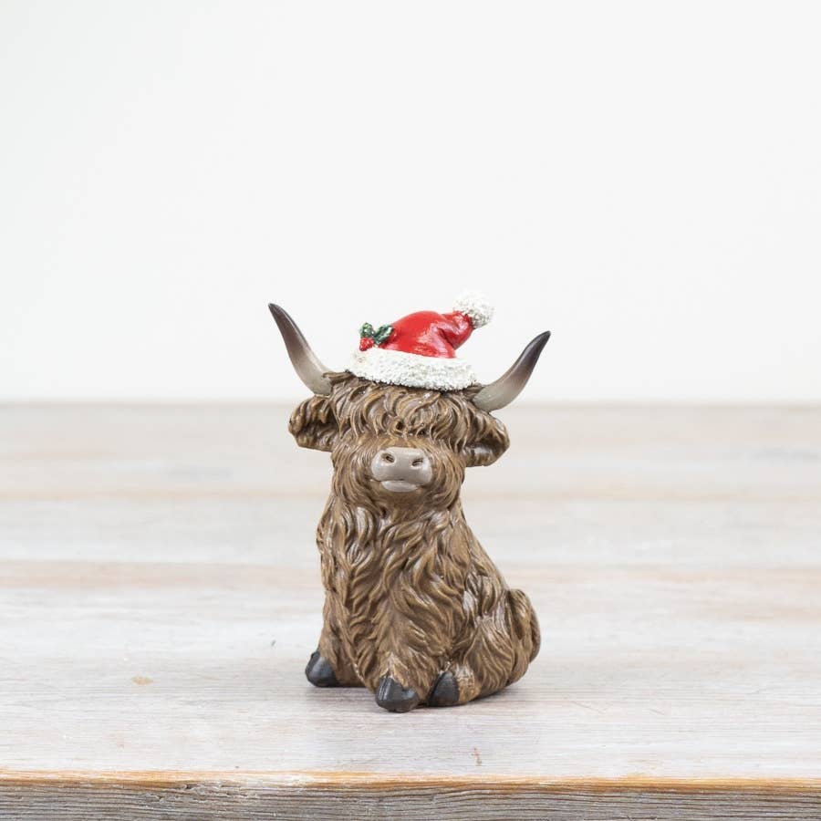 Xmas Sitting Highland Cow 9.5cm