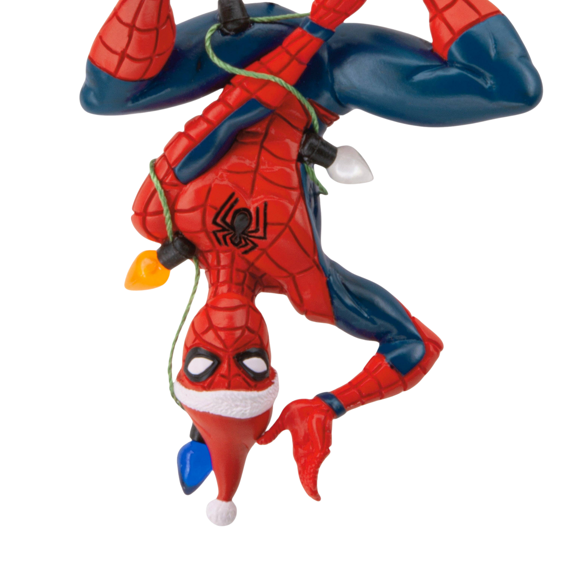 Close-up view of Spider-Man tangled in fairy lights hanging Christmas ornament