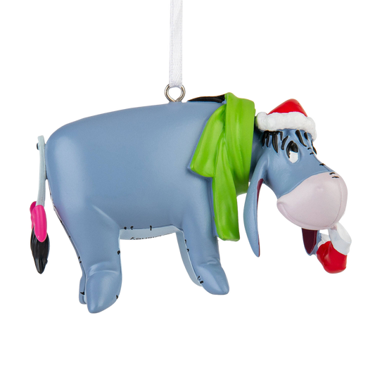 Eeyore donkey Christmas ornament wearing green scarf and red Christmas hat